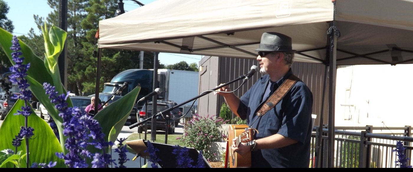 Mark McKechnie performing at the Minto Community Car Show